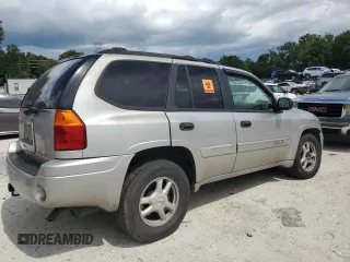 2004 GMC Envoy SLT with VIN 1GKDT13S042430007, listed as a Copart auction lot 67445104 with 182,067 mi miles and Non Repairable. Bid and sale history available at DreamBid. Image 3.