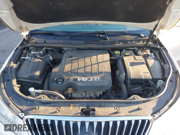 2013 Buick LaCrosse Touring with VIN 1G4GJ5E32DF162786, listed as a IAAI auction lot 41327452 with 221,117 mi miles and . Bid and sale history available at DreamBid. Image 10.