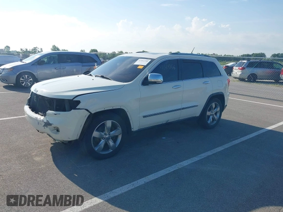 2011 Jeep Grand Cherokee Overland with VIN 1J4RR6GT2BC631909, listed as a IAAI auction lot 42564356 with 205,954 mi miles and . Bid and sale history available at DreamBid. Image 17.