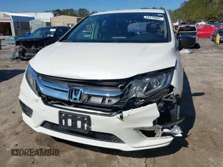 2019 Honda Odyssey LX with VIN 5FNRL6H23KB049236, listed as a IAAI auction lot 41633339 with 96,000 mi miles and . Bid and sale history available at DreamBid. Image 6.
