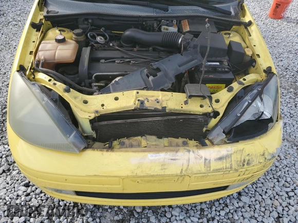 2004 Ford Focus ZX5 z VIN 3FAFP37344R117096, wystawiony jako Copart lot #82789344 z przebiegiem 188 029 mil mil oraz Szkoda całkowita • Salvage title. Historia ofert i sprzedaży dostępna na DreamBid. Obrazek 11.