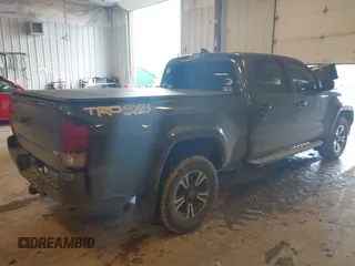 2016 Toyota Tacoma SR5 with VIN 5TFDZ5BN8GX012377, listed as a IAAI auction lot 41688620 with 138,531 mi miles and . Bid and sale history available at DreamBid. Image 4.