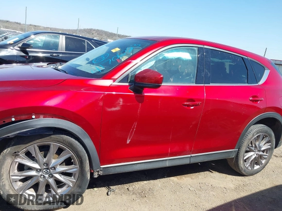 2019 Mazda CX-5 Grand Touring with VIN JM3KFADM5K1556917, listed as a IAAI auction lot 41706323 with 77,804 mi miles. Bid and sale history available at carsss.com. Image 14.