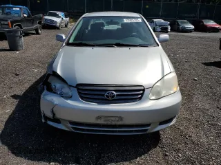 2003 Toyota Corolla CE with VIN 1NXBR32E43Z169570, listed as a Copart auction lot 52905785 with 175,487 mi miles and Salvage Title. Bid and sale history available at DreamBid. Image 13.
