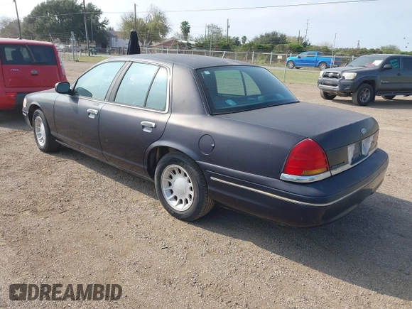 2000 Ford Crown Victoria LX z VIN 2FAFP74W4YX188831, wystawiony jako IAAI lot #41221337 z przebiegiem 169 380 mil mil oraz . Historia ofert i sprzedaży dostępna na DreamBid. Obrazek 3.