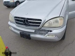 2003 Mercedes-Benz M-Class with VIN 4JGAB75E33A378920, listed as a IAAI auction lot 41914065 with 232,968 mi miles. Bid and sale history available at carsss.com. Image 6.