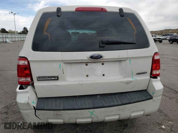 2009 Ford Escape XLS with VIN 1FMCU92749KB31140, listed as a Copart auction lot 53645705 with 213,481 mi miles and Salvage title. Bid and sale history available at DreamBid. Image 6.