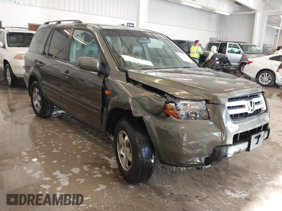2006 Honda Pilot EX-L with VIN 5FNYF187X6B026463, listed as a IAAI auction lot 41612181 with 242,828 mi miles and . Bid and sale history available at DreamBid. Image 1.