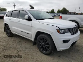 2017 Jeep Grand Cherokee Laredo with VIN 1C4RJEAG2HC702859, listed as a Copart auction lot 54891225 with Not provided miles and Salvage title. Bid and sale history available at DreamBid. Image 4.