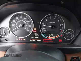 2014 BMW 3 Series 328i xDrive with VIN WBA3B5C51EP543364, listed as a IAAI auction lot 42138365 with 145,243 mi miles and . Bid and sale history available at DreamBid. Image 7.