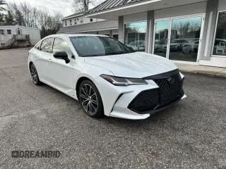 2021 Toyota Avalon z VIN 4T1GZ1FB0MU059272, wystawiony jako Copart lot #83099874 z przebiegiem 112 789 mil mil oraz Czysty tytuł • Clean title. Historia ofert i sprzedaży dostępna na DreamBid. Obrazek 1.