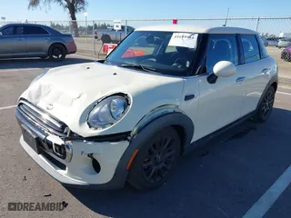 2018 MINI Hardtop 4 Door Cooper with VIN WMWXU1C58J2F80703, listed as a IAAI auction lot 41655964 with 65760 miles. Bid and sale history available at carsss.com. Image 17.