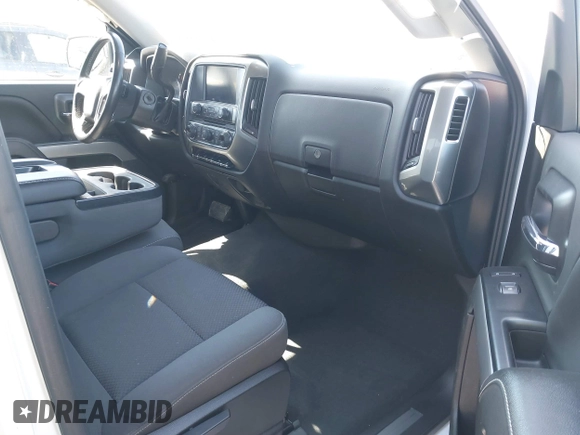 2018 Chevrolet Silverado 1500 LT with VIN 3GCUKREC3JG634354, listed as a IAAI auction lot 41734436 with 135,846 mi miles. Bid and sale history available at carsss.com. Image 5.