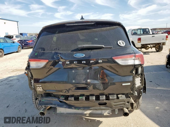2020 Ford Escape SE z VIN 1FMCU0G62LUA54114, wystawiony jako Copart lot #58015855 z przebiegiem 106 857 mil mil oraz Szkoda całkowita • Salvage title. Historia ofert i sprzedaży dostępna na DreamBid. Obrazek 6.