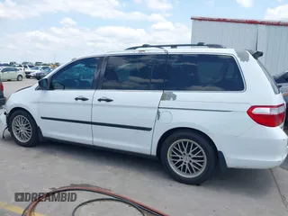2007 Honda Odyssey LX with VIN 5FNRL382X7B135892, listed as a IAAI auction lot 42223231 with 204,054 mi miles and . Bid and sale history available at DreamBid. Image 15.