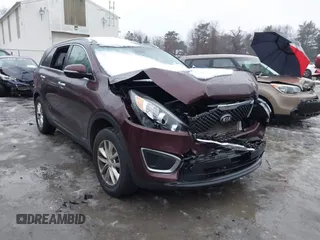 2016 Kia Sorento LX with VIN 5XYPGDA32GG128755, listed as a IAAI auction lot 41025327 with 166,424 mi miles. Bid and sale history available at carsss.com. Image 6.