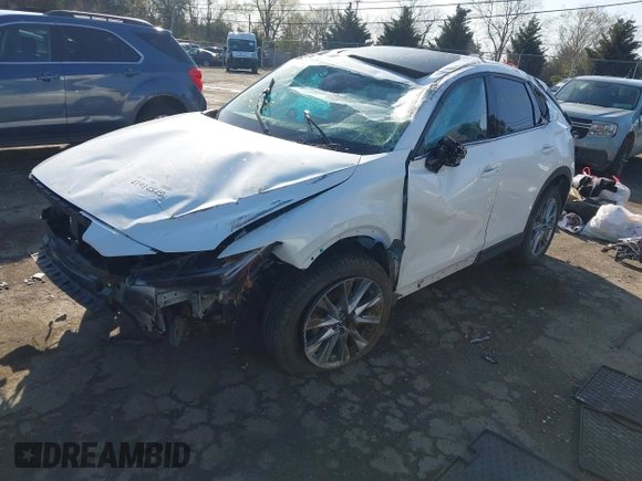 2020 Mazda CX-5 Grand Touring with VIN JM3KFBDM6L0751471, listed as a IAAI auction lot 41914849 with Not Provided miles and . Bid and sale history available at carsss.com. Image 17.