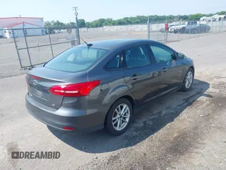 2016 Ford Focus SE with VIN 1FADP3F28GL403388, listed as a IAAI auction lot 42800054 with 190,860 mi miles and . Bid and sale history available at DreamBid. Image 4.