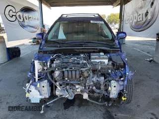 2022 Toyota Corolla Cross LE with VIN 7MUCAAAG6NV021103, listed as a Copart auction lot 56882015 with 21,769 mi miles and Salvage title. Bid and sale history available at DreamBid. Image 5.