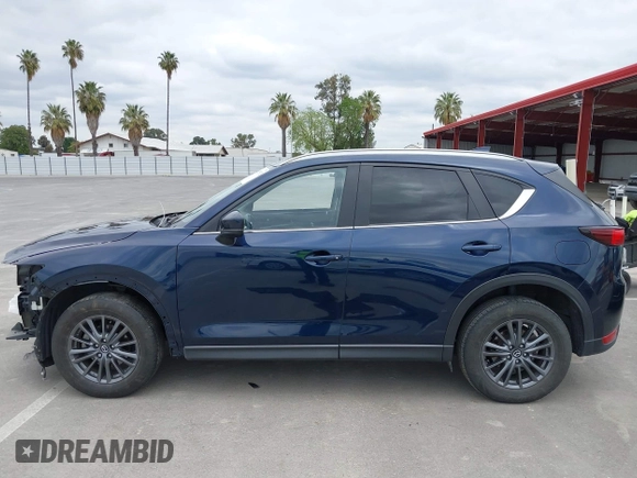 2020 Mazda CX-5 Touring with VIN JM3KFACM2L0856777, listed as a IAAI auction lot 42073972 with 151,628 mi miles. Bid and sale history available at carsss.com. Image 15.