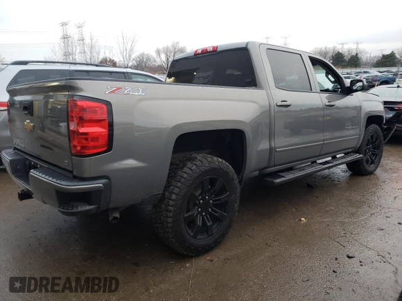 2017 Chevrolet Silverado 1500 LT with VIN 3GCUKREC0HG287527, listed as a Copart auction lot 84900274 with 121,617 mi miles and Salvage Title. Bid and sale history available at DreamBid. Image 3.