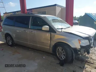 2014 Dodge Grand Caravan SXT with VIN 2C4RDGCG8ER244201, listed as a IAAI auction lot 42017091 with 161,653 mi miles and . Bid and sale history available at DreamBid. Image 14.