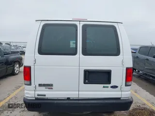 2014 Ford Econoline Cargo Commercial z VIN 1FTNE2EW7EDA00870, wystawiony jako IAAI lot #42384856 z przebiegiem 156 312 mil mil oraz . Historia ofert i sprzedaży dostępna na DreamBid. Obrazek 16.
