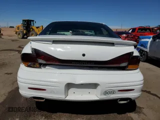 1999 Pontiac Bonneville SE z VIN 1G2HX52K3XH226172, wystawiony jako Copart lot #71655164 z przebiegiem 242 429 mil mil oraz Szkoda całkowita • Salvage title. Historia ofert i sprzedaży dostępna na DreamBid. Obrazek 6.