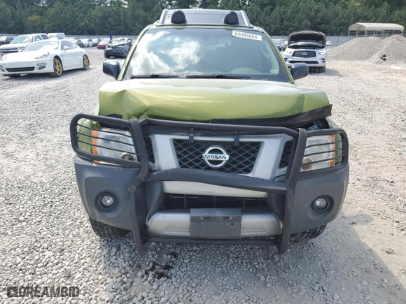 2011 Nissan Xterra Pro-4X with VIN 5N1AN0NW6BC523782, listed as a Copart auction lot 69386664 with 105,606 mi miles and Salvage Title. Bid and sale history available at carsss.com. Image 5.