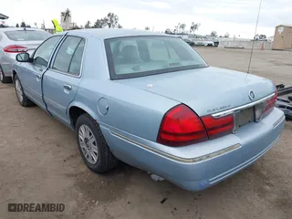 2005 Mercury Grand Marquis GS with VIN 2MEFM74W45X629662, listed as a IAAI auction lot 42075152 with 65,941 mi miles. Bid and sale history available at carsss.com. Image 3.
