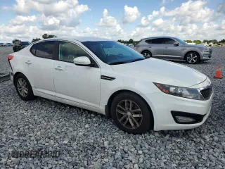 2013 Kia Optima LX z VIN KNAGM4A74D5380729, wystawiony jako Copart lot #56555835 z przebiegiem 126 904 mil mil oraz Szkoda całkowita • Salvage title. Historia ofert i sprzedaży dostępna na DreamBid. Obrazek 4.