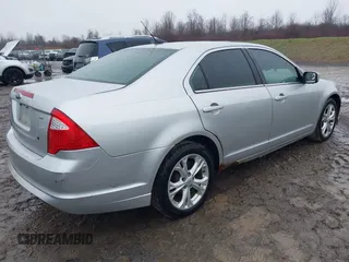 2012 Ford Fusion SE with VIN 3FAHP0HA9CR164546, listed as a IAAI auction lot 42016566 with 185,251 mi miles. Bid and sale history available at carsss.com. Image 4.