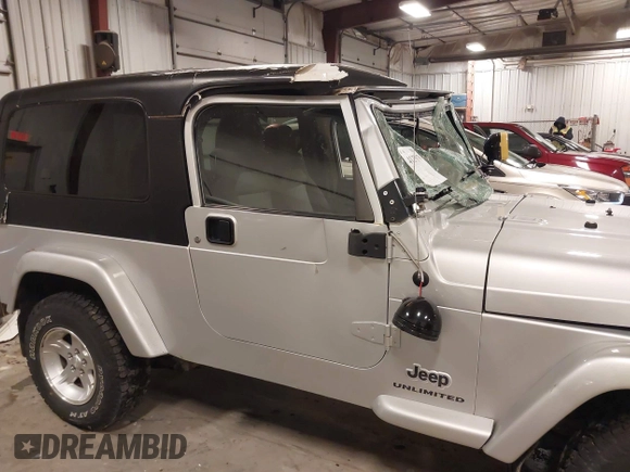 2005 Jeep Wrangler Unlimited with VIN 1J4FA44S05P359173, listed as a IAAI auction lot 41275179 with 75,035 mi miles. Bid and sale history available at carsss.com. Image 13.