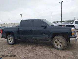 2015 Chevrolet Silverado 1500 LT with VIN 3GCUKREHXFG222242, listed as a IAAI auction lot 41572445 with 168,674 mi miles. Bid and sale history available at carsss.com. Image 13.