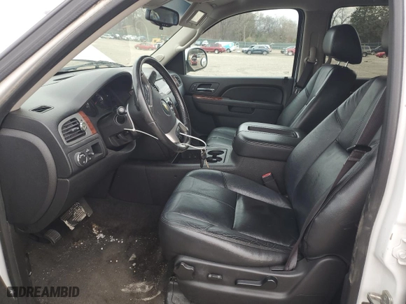 2013 Chevrolet Suburban LT with VIN 1GNSCJE02DR202622, listed as a Copart auction lot 87671395 with 159,146 mi miles and Salvage Title. Bid and sale history available at carsss.com. Image 7.