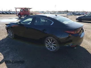 2021 Mazda 3 Premium with VIN 3MZBPADL1MM203008, listed as a Copart auction lot 48887465 with 66,192 mi miles and Salvage title. Bid and sale history available at DreamBid. Image 2.