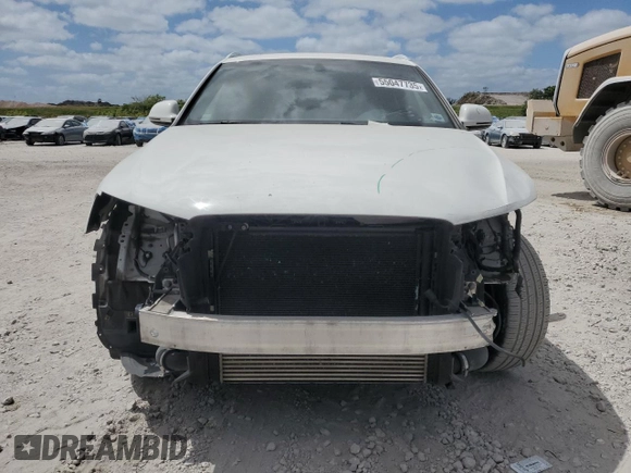 2018 Audi Q3 Premium with VIN WA1ECCFS1JR034690, listed as a Copart auction lot 55047735 with 73,488 mi miles and Salvage title. Bid and sale history available at DreamBid. Image 5.
