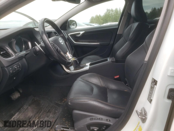 2018 Volvo V60 z VIN YV440MWK1J2051771, wystawiony jako Copart lot #67960674 z przebiegiem 49 782 mil mil oraz Szkoda całkowita • Salvage title. Historia ofert i sprzedaży dostępna na DreamBid. Obrazek 7.