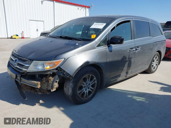 2012 Honda Odyssey EX-L with VIN 5FNRL5H69CB128585, listed as a IAAI auction lot 41695109 with 231,565 mi miles and . Bid and sale history available at carsss.com. Image 17.