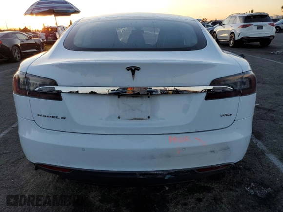 2015 Tesla Model S 85D with VIN 5YJSA1S21FF087461, listed as a Copart auction lot 87027334 with 53,868 mi miles and Salvage Title. Bid and sale history available at carsss.com. Image 6.