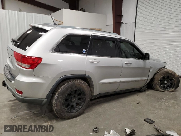 2011 Jeep Grand Cherokee Laredo z VIN 1J4RR4GGXBC609891, wystawiony jako Copart lot #52089645 z przebiegiem 180 895 mil mil oraz Szkoda całkowita • Salvage title. Historia ofert i sprzedaży dostępna na DreamBid. Obrazek 3.