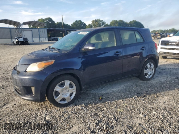 2014 Scion xD with VIN JTKKUPB49E1040402, listed as a Copart auction lot 64997275 with 242,266 mi miles and Clean title. Bid and sale history available at DreamBid. Image 1.