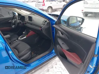 2016 Mazda CX-3 Touring z VIN JM1DKFC72G0138818, wystawiony jako IAAI lot #41371058 z przebiegiem 44 309 mil mil oraz . Historia ofert i sprzedaży dostępna na DreamBid. Obrazek 5.