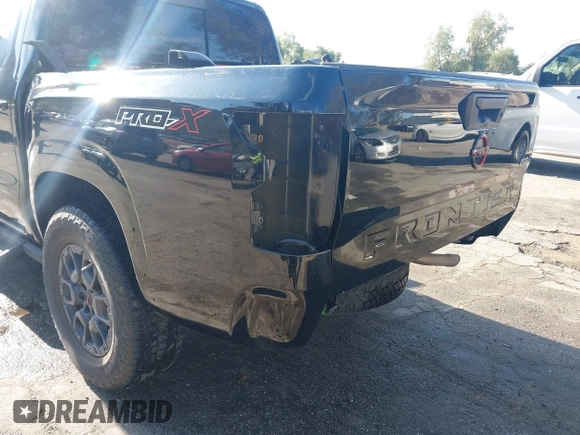 2023 Nissan Frontier Pro-X with VIN 1N6ED1EJ6PN619651, listed as a IAAI auction lot 41838415 with 69,819 mi miles and . Bid and sale history available at DreamBid. Image 18.
