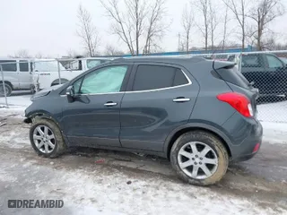 2016 Buick Encore Leather with VIN KL4CJGSB2GB651012, listed as a IAAI auction lot 41550230 with 121,316 mi miles. Bid and sale history available at carsss.com. Image 13.