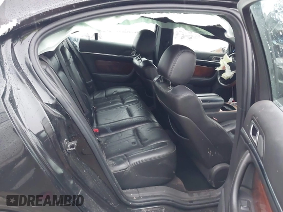2014 Lincoln MKS with VIN 1LNHL9DK6EG609386, listed as a IAAI auction lot 41195270 with 144,395 mi miles and . Bid and sale history available at DreamBid. Image 8.
