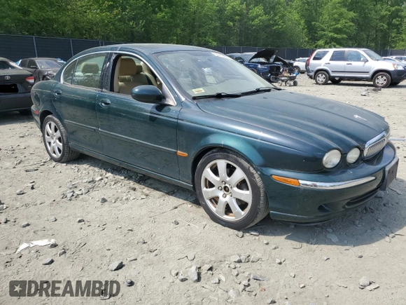 2004 Jaguar X-Type with VIN SAJEA51C64WE17722, listed as a Copart auction lot 55416405 with 89,047 mi miles and Salvage Title. Bid and sale history available at DreamBid. Image 4.