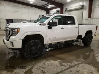 2020 GMC Sierra 3500HD Denali z VIN 1GT49WEY3LF254084, wystawiony jako Copart lot #87234124 z przebiegiem 46 642 mil mil oraz Szkody całkowita. Historia ofert i sprzedaży dostępna na DreamBid. Obrazek 1.