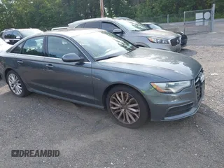 2014 Audi A6 Prestige with VIN WAUHGAFC0EN048045, listed as a IAAI auction lot 42582288 with 150,114 mi miles and . Bid and sale history available at DreamBid. Image 1.