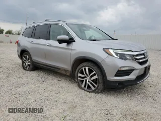 2017 Honda Pilot Touring z VIN 5FNYF6H92HB006855, wystawiony jako Copart lot #53650655 z przebiegiem 130 732 mil mil oraz Szkoda całkowita • Salvage title. Historia ofert i sprzedaży dostępna na DreamBid. Obrazek 4.